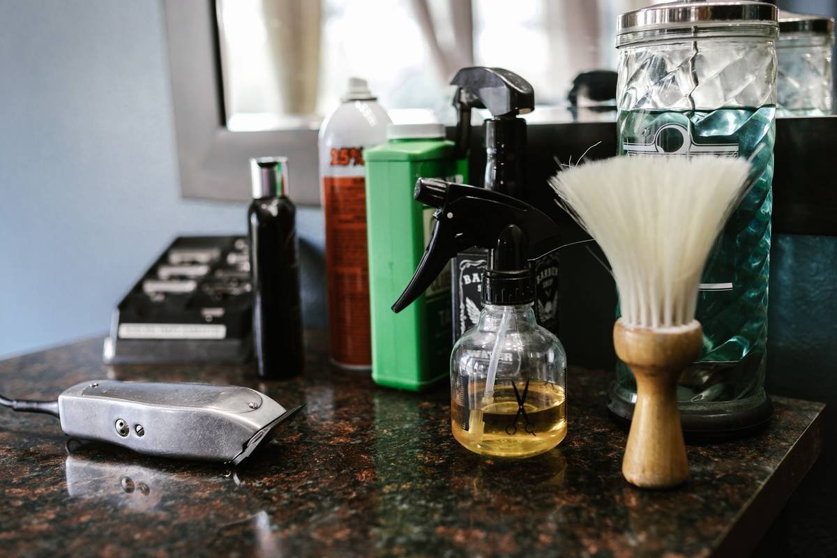 Close-up comparison of vintage vs. modern shaving brush knots showing tighter hand-tied vintage knot with natural tapering